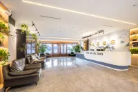 Yunan Business Hotel (Taoxian Airport Shenyang Conservatory of Music)