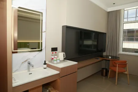 QI  MAN  HOTEL Отели в г. Чаючжунци