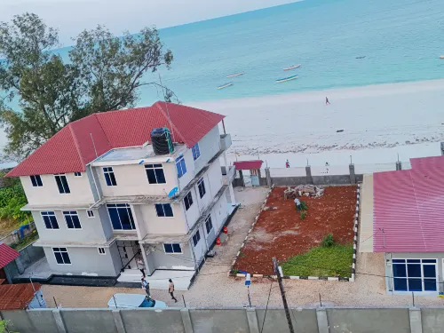 Uroa Beachfront 2BR • Balcony • Free Wi-Fi