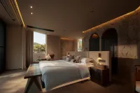 Wutong Jiuli · Art Courtyard-Style Hotel (Wanning Shimei Bay) - balkon