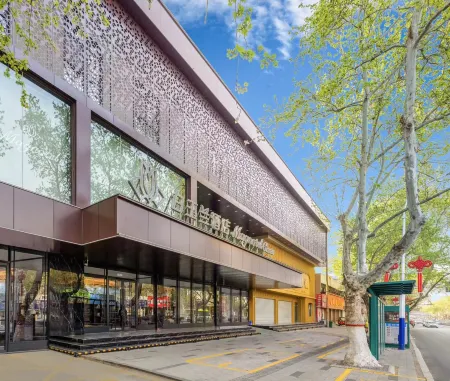 Magnotel （Business）Zaozhuang Wuyue Plaza Hotel Отели рядом с достопримечательностью «Guanshi Durian Garden Tourist Resort»