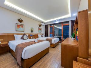 Orange Select Hotel (Xishuangbanna Jinghong Splashing Square)