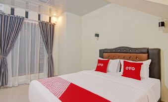 Super OYO Capital O 90643 Suri Guest House Syariah