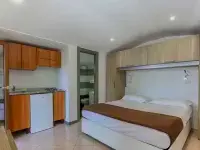 Village Camping Santa Fortunata - Campogaio Отели рядом с достопримечательностью «Пляж Леонеллис»