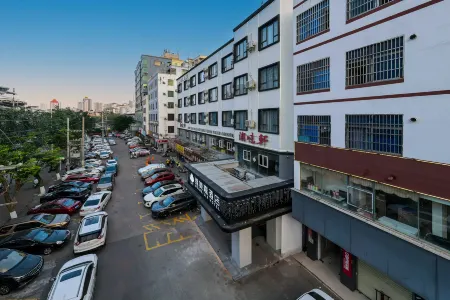 Weimeijia Hotel (Haikou East Railway Station Longfor Paradise Walk Branch) Отели рядом с достопримечательностью «Hainan Medical University (Chengxi Campus)»
