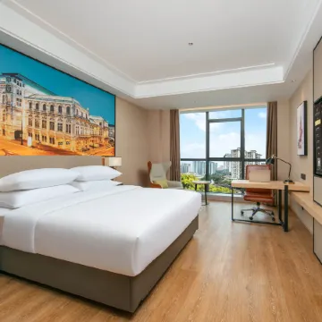 Vienna International Hotel (Chongqing Fuling Baolong Plaza Branch) Отели рядом с достопримечательностью «Стадион «Фулин»»