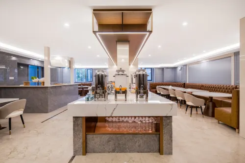 Pu Jue International Hotel (Shanghai Songjiang Xin Qiao) Питание Photos