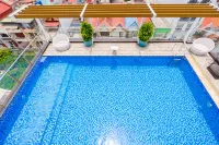 GM International Hotel and Apartment - สระว่ายน้ำบนดาดฟ้า