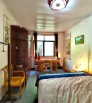 Cunyuan Thatched Cottage Inn Hotels in Bome