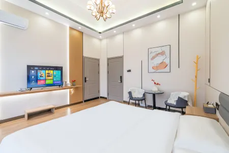 Lvshun Jianian Meishu Holiday Inn(Changjiang Rd& Yingchun St) Отели рядом с достопримечательностью «Dalian University of Foreign Languages (Lvshun South Road)»