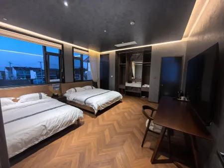 Helan Xiaozhu Homestay (Weishan Lake Tourist Area) Отели в г. Вейшань