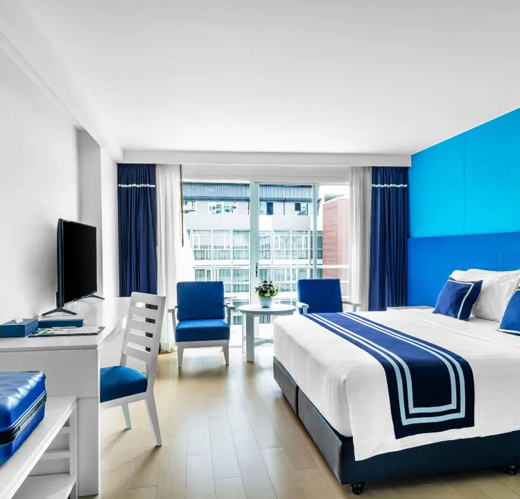 ห้องดีลักซ์เตียงคิง(รวม Coco Play & Coco Pool）