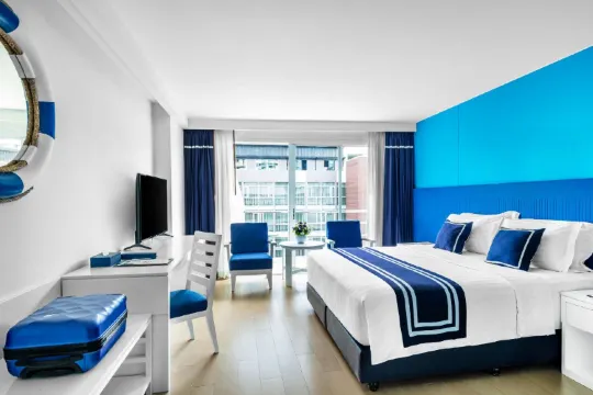 ห้องดีลักซ์เตียงคิง(รวม Coco Play & Coco Pool）