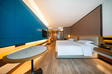 Mingren Hotel Отели в г. Нюинтри