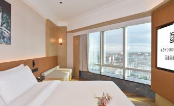 MEHOOD LESTIE Hotel (Beihai Yintan Avenue Qiaogang Fengqing Street)