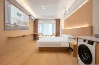 Youshan Suyu Serviced Apartment (Haikou High-Speed Railway East Station Longhu Tianjie) - Condos