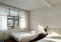 Jinheju Simple Vacation Apartment (Dai Ethnic Ancient Town Mangshi Square) - 2-Star