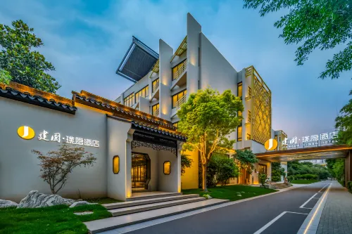 Xinxiang Jianguo HIDDEN Garden-Style Hotel - Balkon