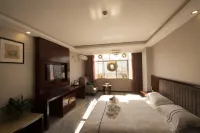 Jubao Hotel Отели рядом с достопримечательностью «Южная остановка пассажирского транспорта в Чжэцзе»