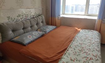 Chengde Homeland Rizu Apartment