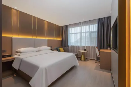 Longkou Jincheng Hotel (Longji Road) Отели рядом с достопримечательностью «Dao'enhu Park»