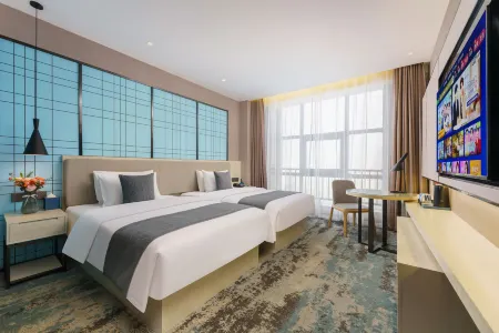 Kuche W · Wanchen Kailai Hotel Отели рядом с достопримечательностью «Qingchengqiang Site»