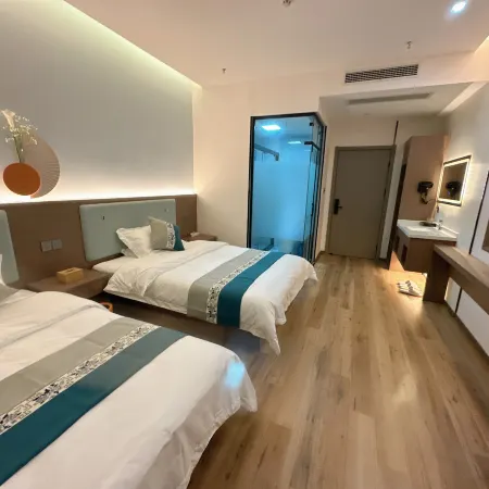 Buke Buzhu Boutique Hotel (Wuxi Binhu Wanda Plaza Hele Kou Subway Station) Отели рядом с достопримечательностью «Си Хи Парк»