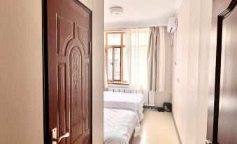 Zhuanghe Huaxing Hotel
