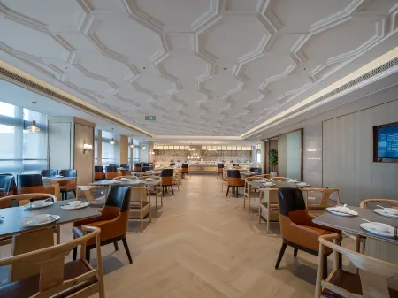 Vienna International Hotel (Chongqing Chenjiaqiao Branch) Отели рядом с достопримечательностью «Chongqing Vocational College of Electronic Engineering University City Campus - Mechanical and Electrical Engineering Center»