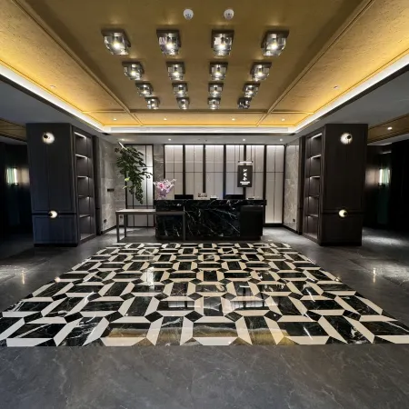 Cheery Dragon Hotel Weihai Jiuzi holds