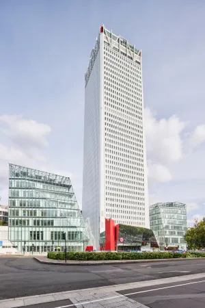 H4 Hotel Wyndham Paris Pleyel Resort Отели рядом с достопримечательностью «Groupe AFNOR»