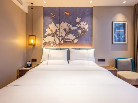 Magnotel Hotel (Tianshui Qin'an Railway Station) Отели в г. Цинань