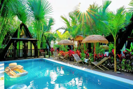 Olive Homestay in Jinghong, Xishuangbanna (located in the Dai Ethnic Minority Park Scenic Area) Отели рядом с достопримечательностью «Menghanman Tingfota Temple»