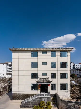 Xinhe Xiaoyuan Homestay (Lijiang High speed Railway Station) Отели рядом с достопримечательностью «Wenfeng Temple»