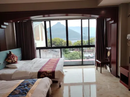 Shuifu Xinyixin Inn Отели рядом с достопримечательностью «Shaonüping Memorial Archway»