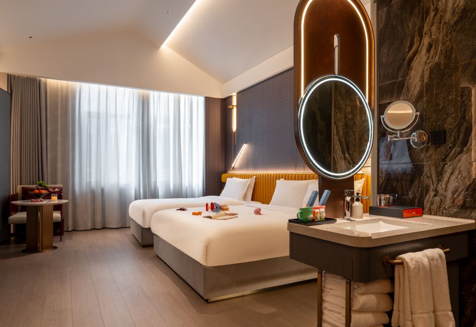 이쟈무플러스 호텔 객실 내부 이미지