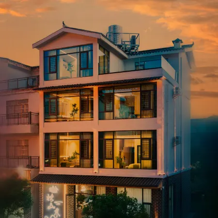 Zhenshanshui Hotel Отели в г. Синъи