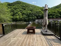 Wangchunshan Courtyard Vacation Apartment (Huanren Wangtiandong National Geopark) - balcony