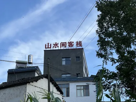 Luoping Shanshuijian Inn Отели в г. Луопинсянь