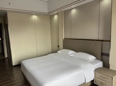 Gangwan Business Hotel Отели рядом с достопримечательностью «Gudou Hot Spring Fortune Cable Car»