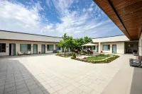新源軒培居|Warm Lodge·庭院休閒民宿（新源客運站店）