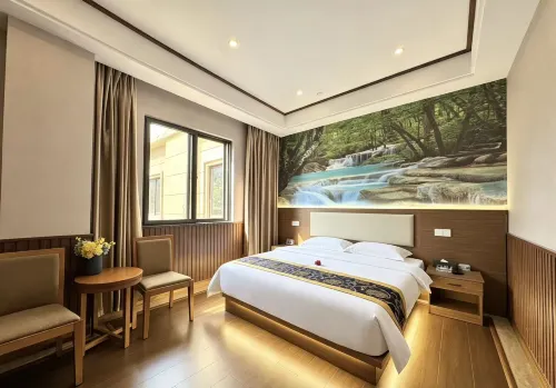 Xingyi Qiaofu Hotel - خدمة نقل من وإلى المطار