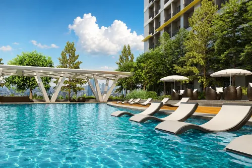 SMDC FAME Apartment near Greenfield - parking