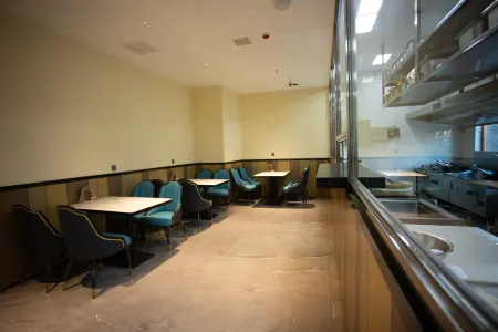 Harbin YIyuanchun Business Hotel Отели рядом с достопримечательностью «The Open University of Harbin Shuangcheng Branch»