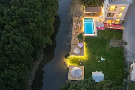 Daochi Garden Hotel Отели рядом с достопримечательностью «Shanghai Wild Animal Park»