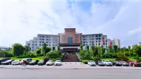 Ramada Plaza by Wyndham Chongqing West Отели рядом с достопримечательностью «Камень Большой Фиги»