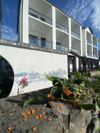 Jiashan YunYingMeiShu Inn Отели рядом с достопримечательностью «Shanghai Shanda University Jiashan Guangxuan College»