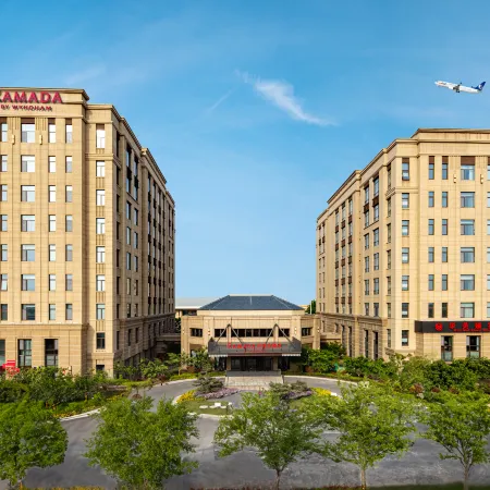 Ramada by Wyndham Qingdao Jiaodong International Airport Отели в г. Цзяочжоу
