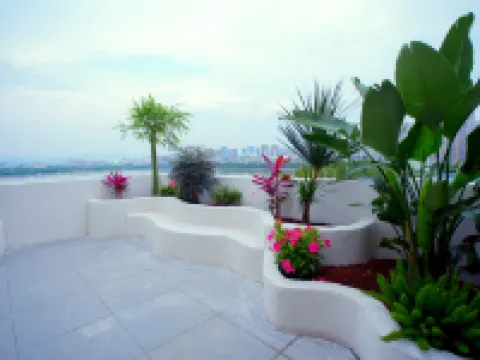 Maitreya Huxi Man Hot Spring Homestay (Huquan Water Town Tourist Resort Scenic Area Branch) Hoteles en Ciudad de Mile