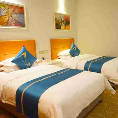 天龍大酒店(大商新瑪特・高鐵西站店) Rooms